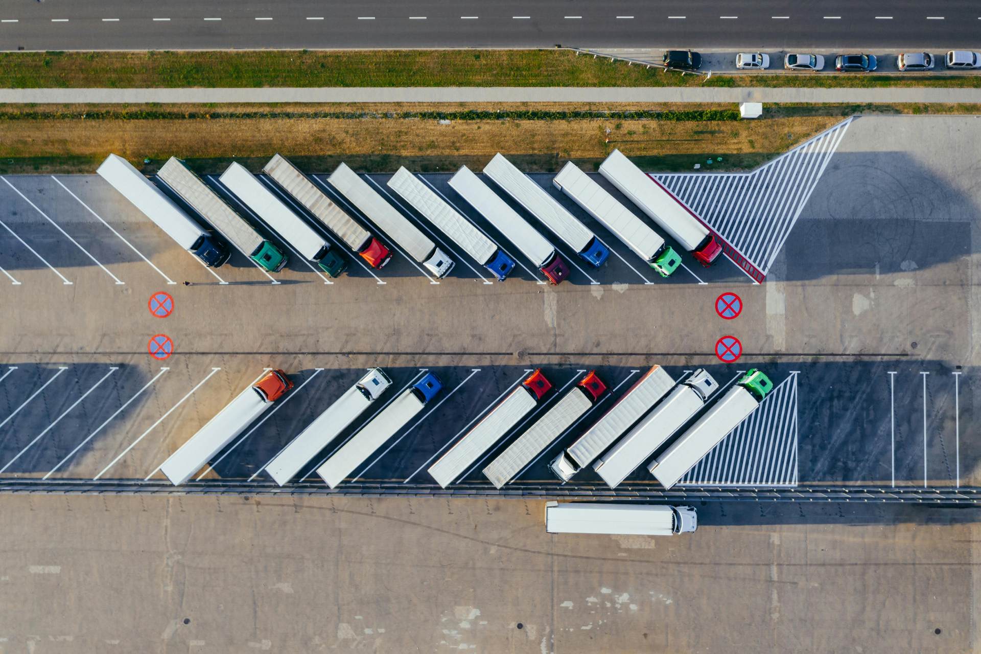 Aerial view of parked trucks in loading area